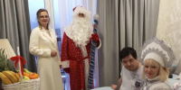 Ульяна Катриченко поздравила с Новым годом инвалида-колясочника Вадима Литовского - Городское Собрание